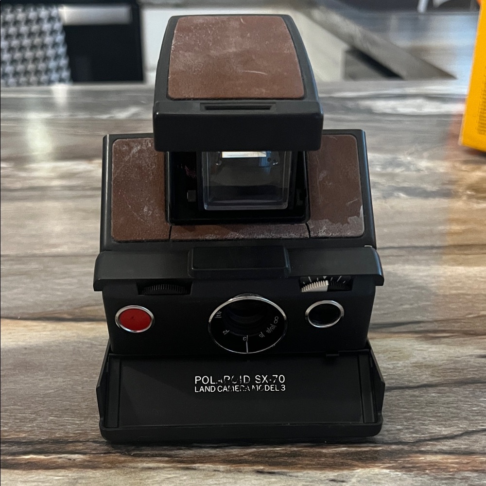Vintage Polaroid SX-70 camera with Pink, Orange, Yellow, Green and Blue  Graphic